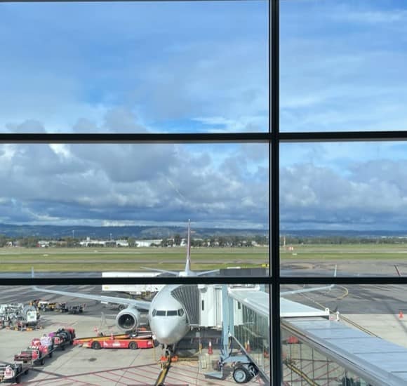 Airplanes on tarmac at airport