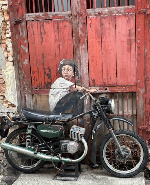 Boy on Motorbike George Town Penang Malaysia 
