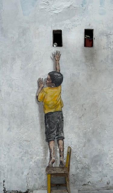 Boy on a Chair mural George Town Penang Malaysia